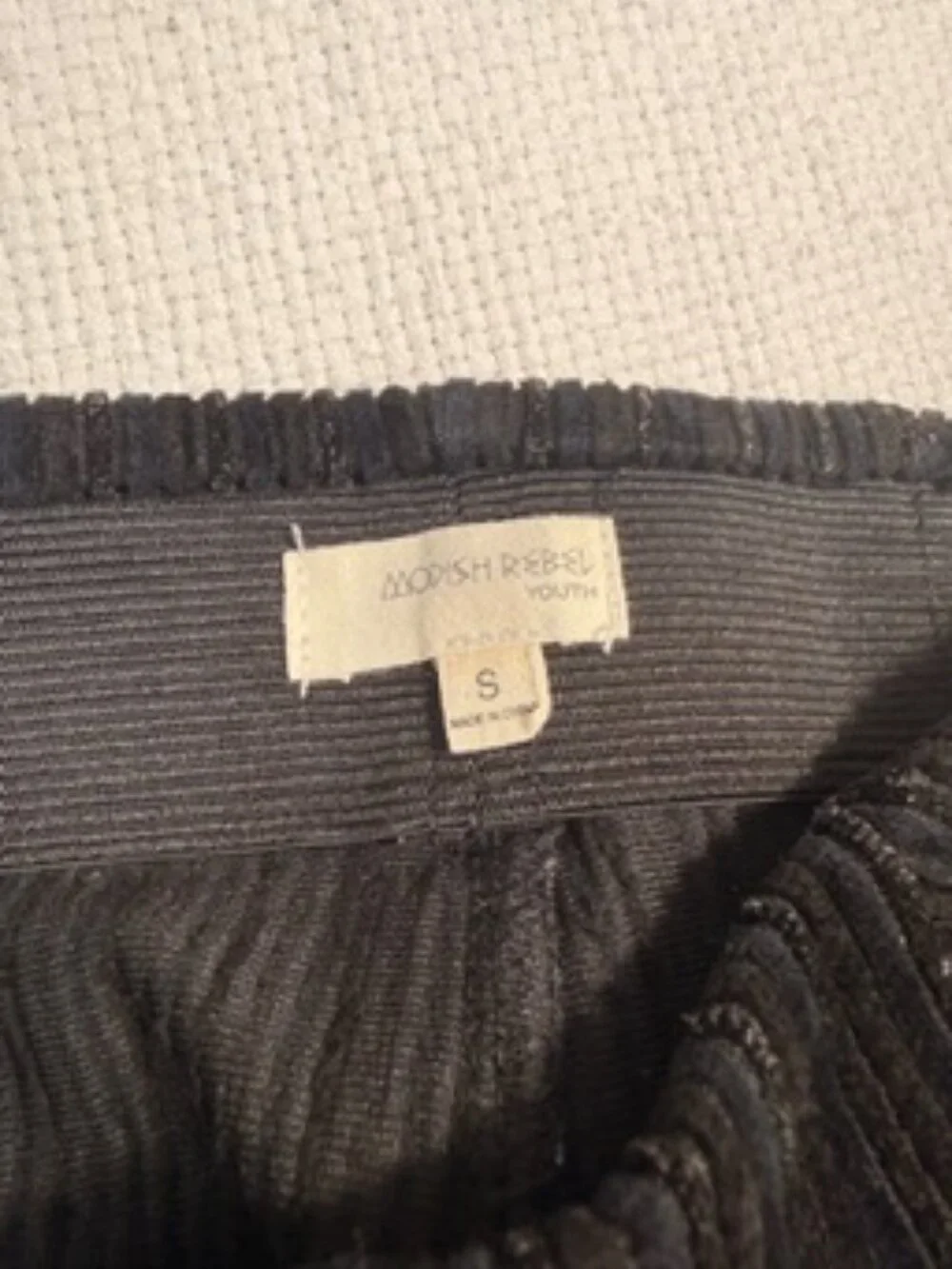 Modish Rebel Youth black ribbed flare pants in size Small.